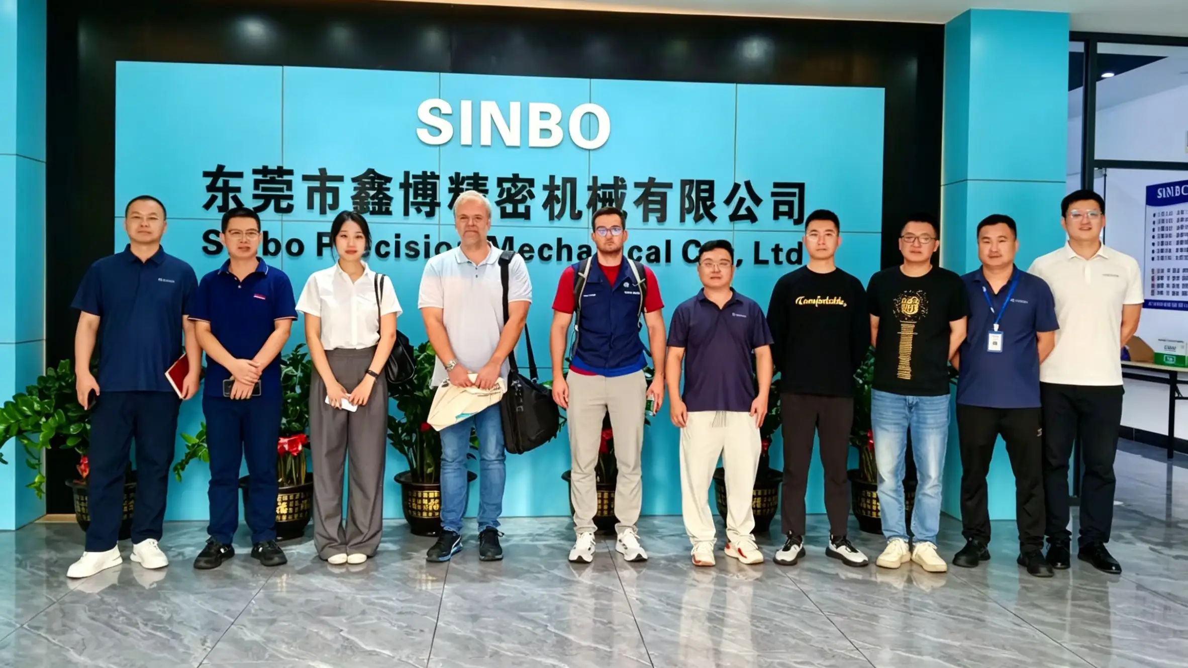 Sinbo Precision team celebrating successful BMW VDA 6.3 audit completion